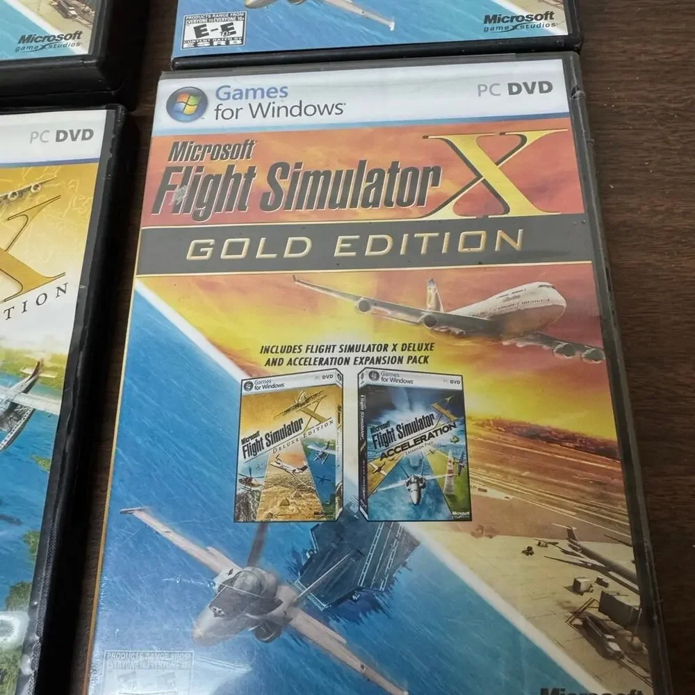 Microsoft flight simulator gold edition and deluxe edition lot of 4